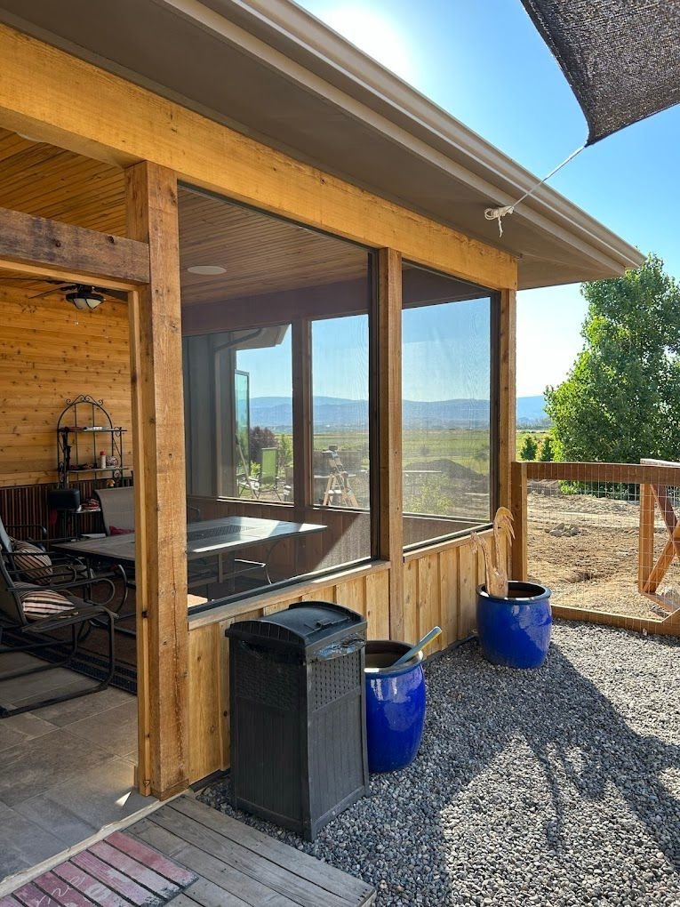 Screened patio with valley views