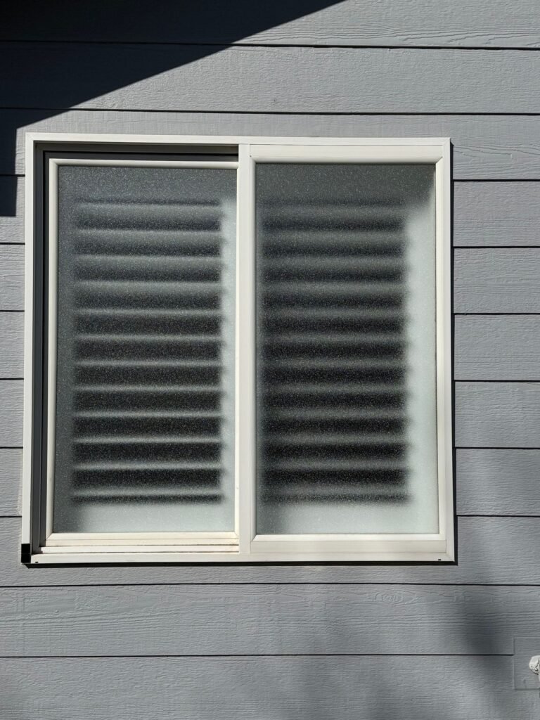 Solar screen on a sliding window